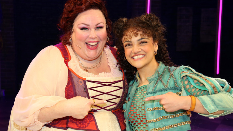 Chrissy Metz smiling with a fellow "& Juliet" cast member.
