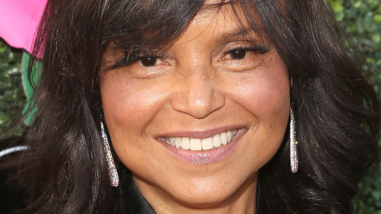 Victoria Rowell smiling earrings