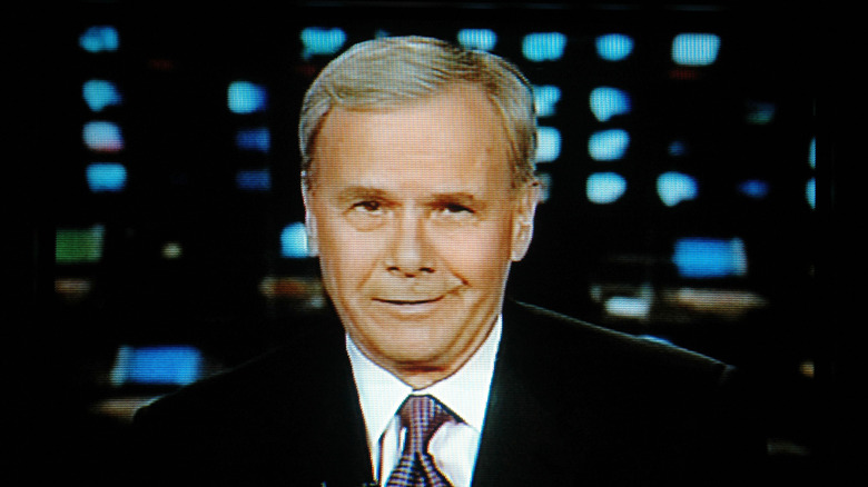 Tom Brokaw on television reporting the news