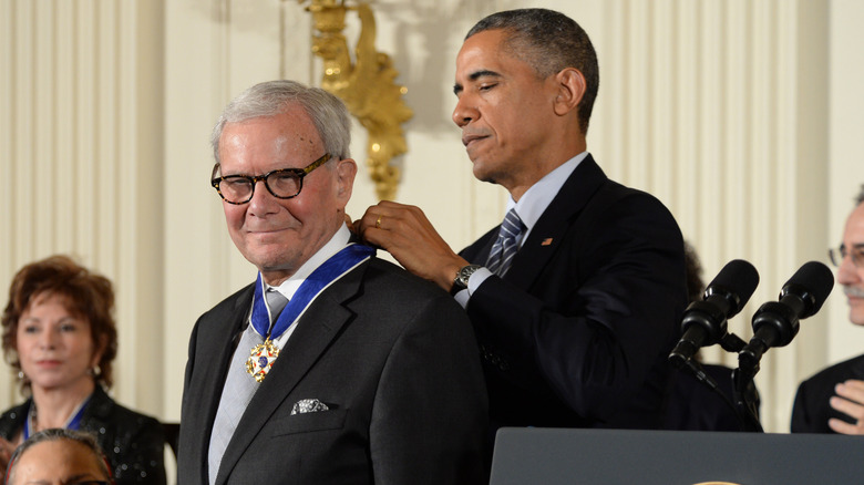 Tom Brokaw receiving the Presidential Medal of Freedom from Barack Obama