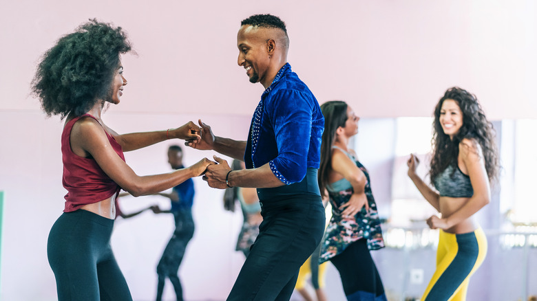 people dancing at fitness class