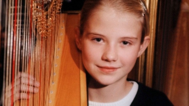 A photo of a young Elizabeth Smart playing harp, circulated during her kidnapping