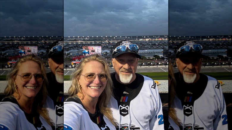Christine Brown and David Woolley at a NASCAR race