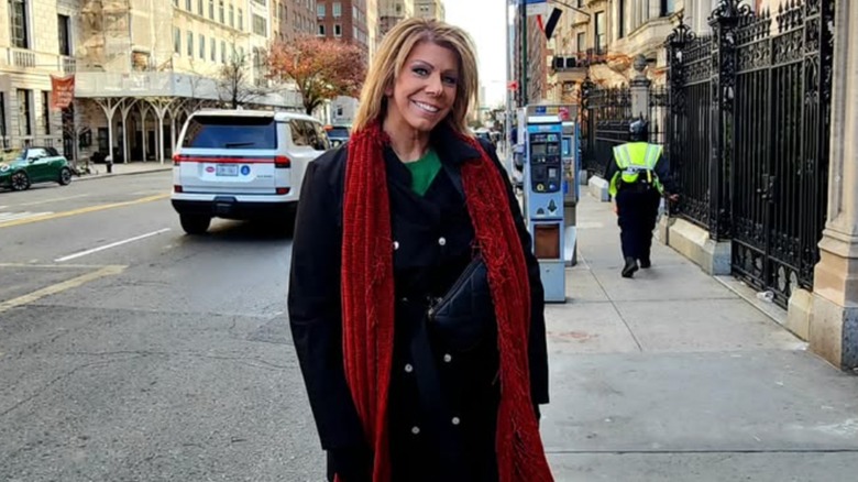 Meri Brown smiling on street