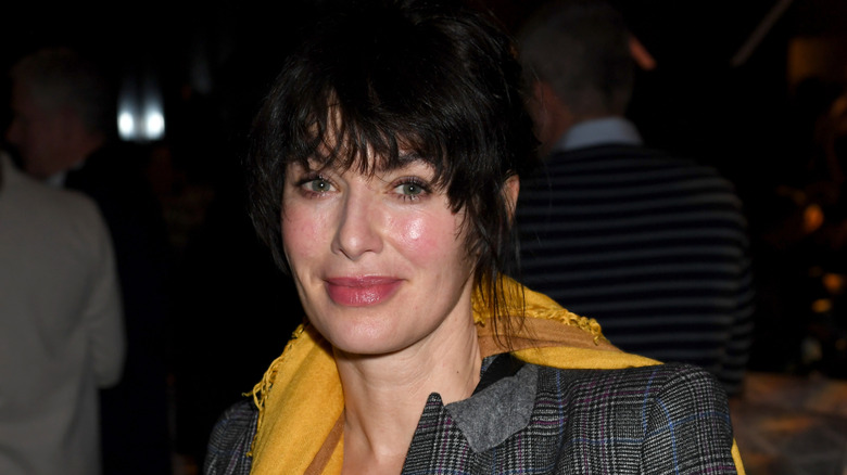 Lena Headey surrounded by people at an industry event