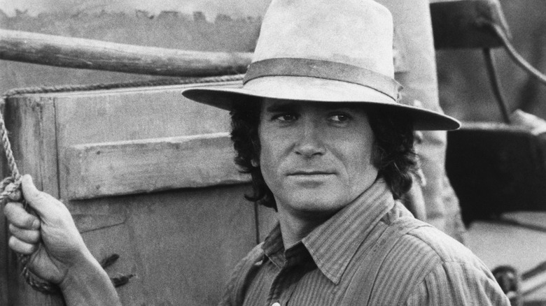 Black and white photo of Michael Landon on set filming Little House on the Prairie in the 70s