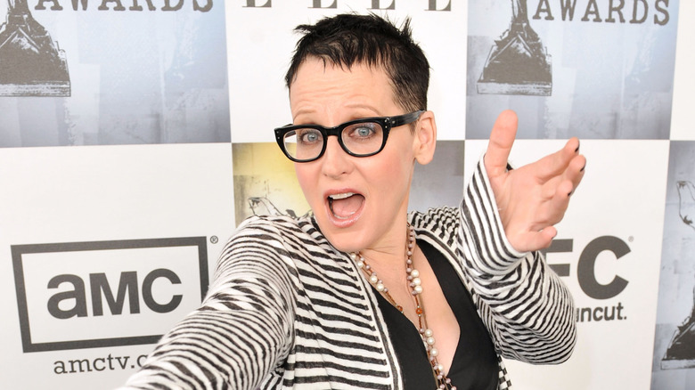 Lori Petty posing in front of an AMC banner