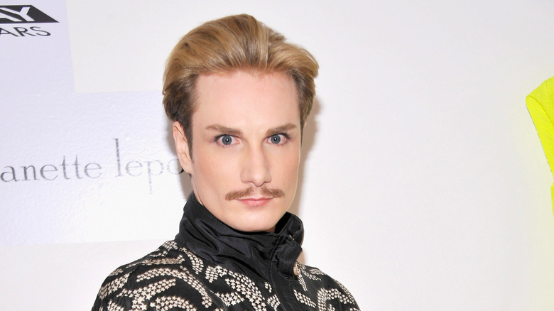 Austin Scarlett posing at an event in 2012.