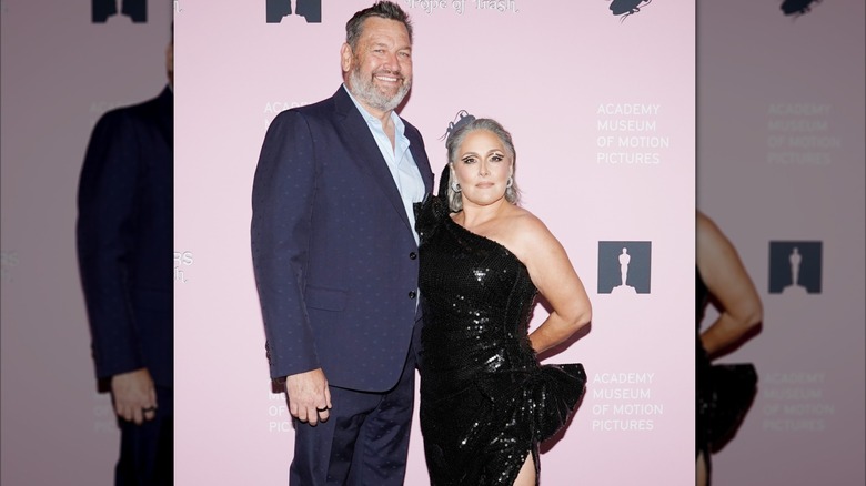 Ross Burningham and Ricki Lake attending the John Waters: Pope of Trash exhibition at the Academy Museum