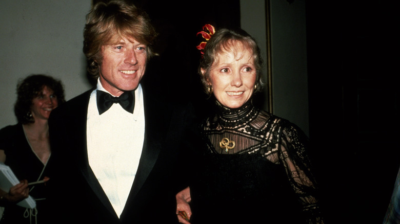 Lola Van Wagenen smiling alongside Robert Redford