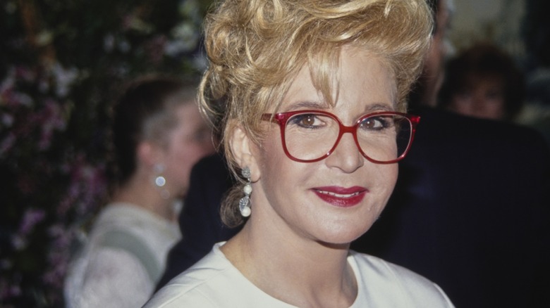 A younger Sally Jessy Raphael in her iconic red glasses