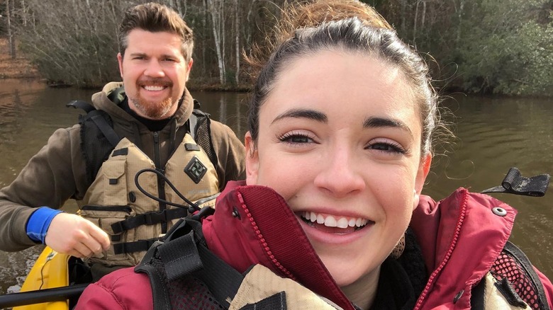 "The Middle" actors Daniela Bobadilla and Beau Wirick smile in a selfie while kayaking wearing life vests.