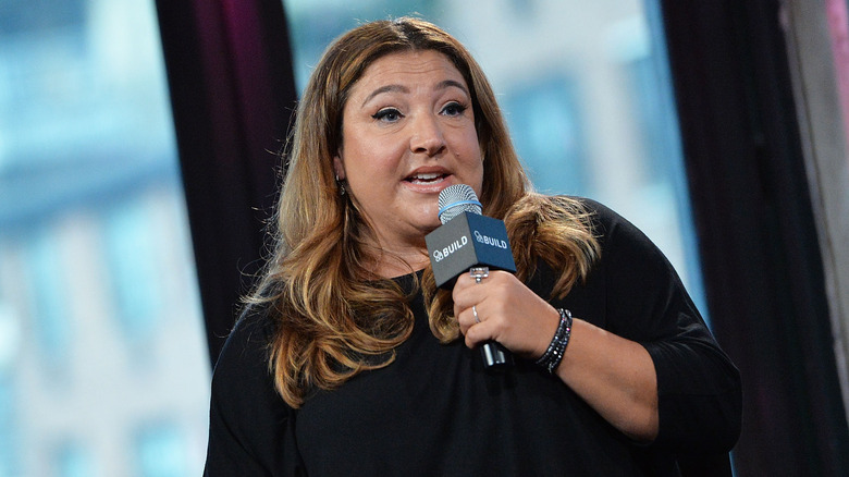 Jo Frost speaking into a microphone