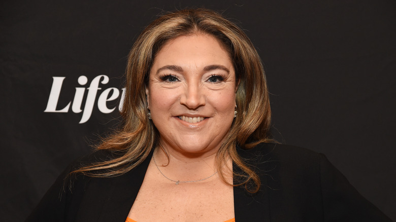 Jo Frost smiling at an event