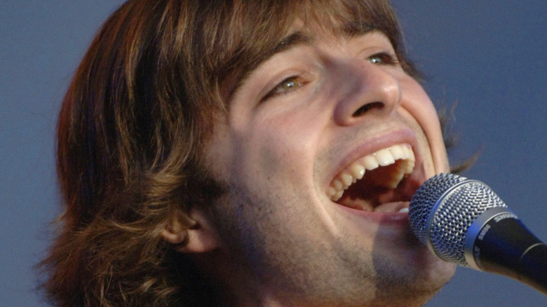 Closeup of Robert Schwartzman singing on stage in 2006