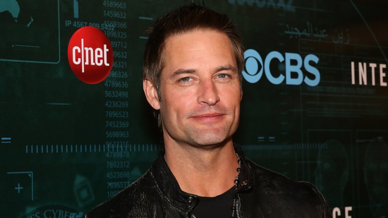 Josh Holloway with short hair on a step-and-repeat for CBS show Intelligence