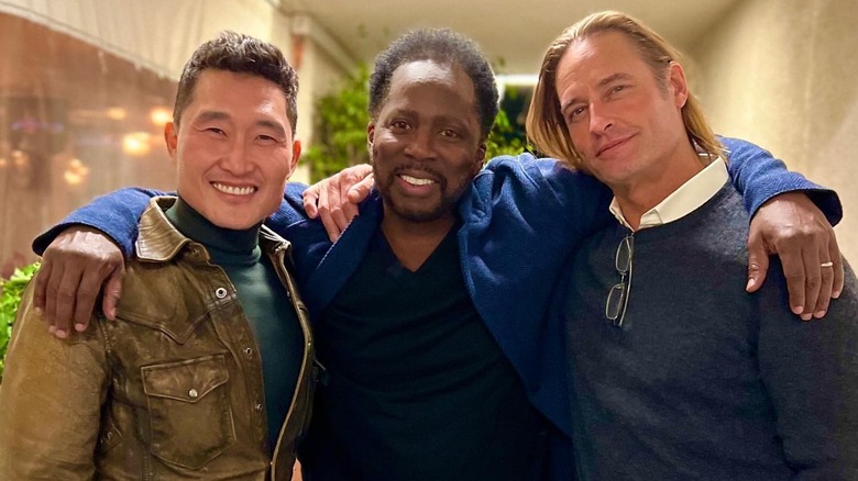 Daniel Dae Kim, Harold Perrineau, and Josh Holloway smiling in a 2022 Instagram photo