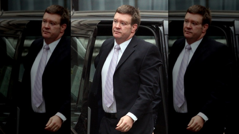 Trevor Rees-Jones exiting a car 11 years after the accident.