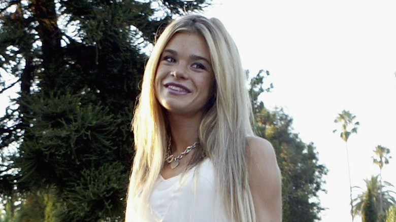 Ellen Muth in front of 