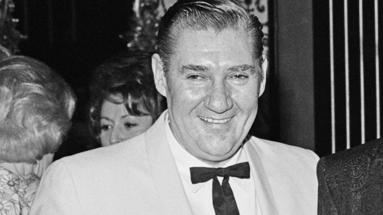 Pat Buttram wearing a suit and a bow tie