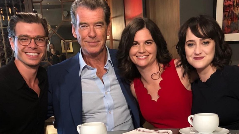 Matthew Lawrence, Pierce Brosnan, Lisa Jakub, and Mara Wilson smiling