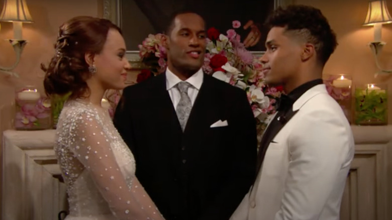 Nicole and Zende at the altar