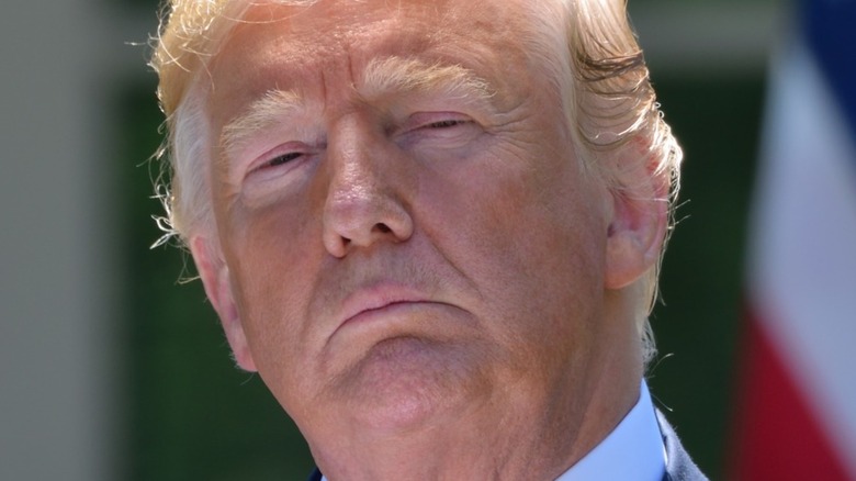 Donald Trump frowning