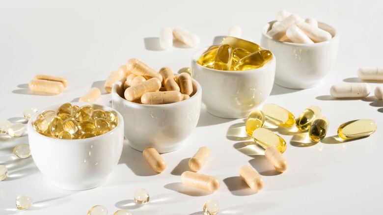 Vitamins and supplements in bowls