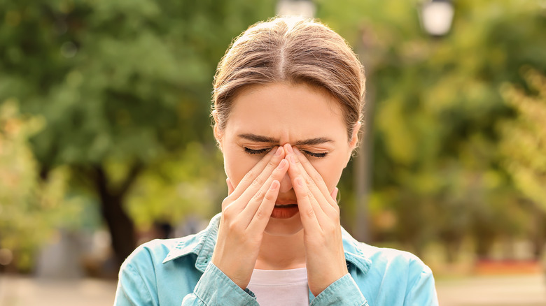 A person dealing with allergies 