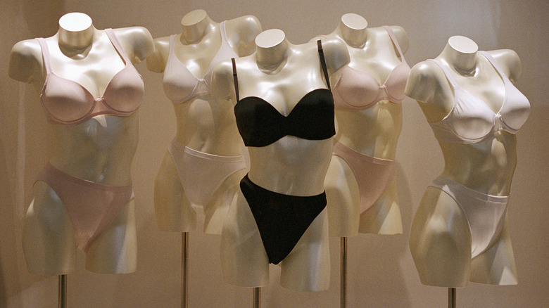 Five mannequins wearing bras and panties