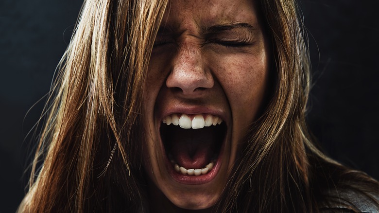 Close up angry woman yelling