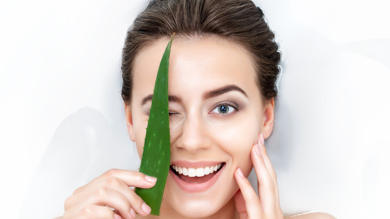 Aloe vera on woman's face