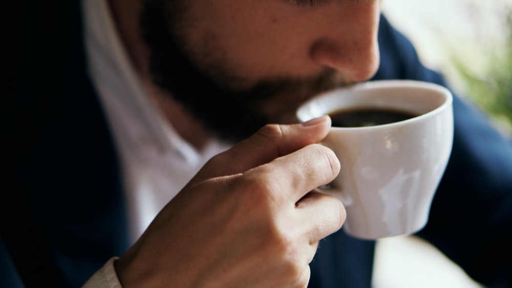 Man drinking coffee