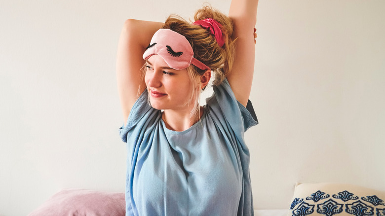 woman in eye mask