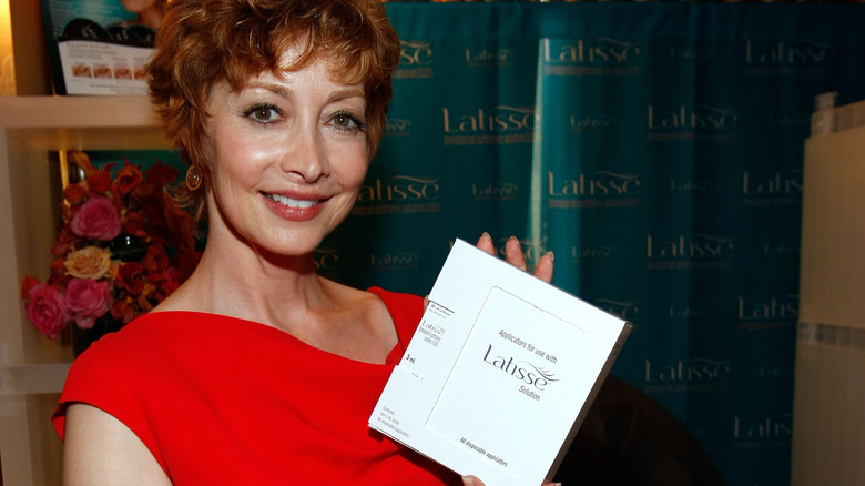 Actress Sharon Lawrence poses at the Latisse booth during the HBO Luxury Lounge in honor of the 61st Primetime Emmy Awards held at the Four Seasons Hotel 