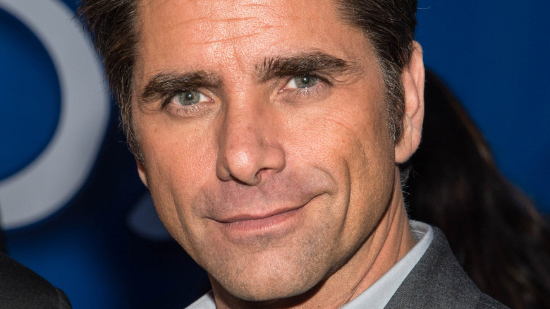 John Stamos on the red carpet. 