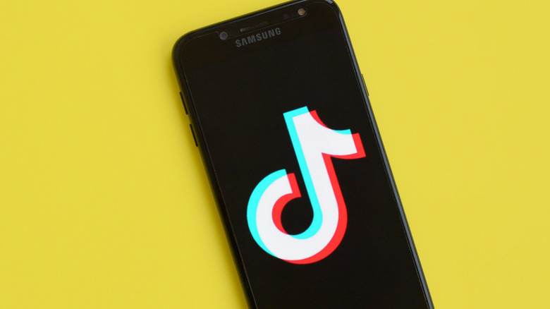 TikTok logo on phone