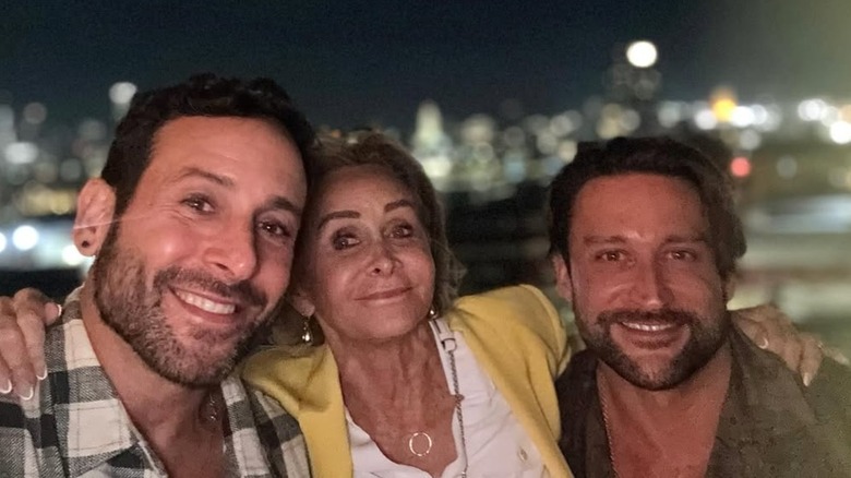 Carmine Sabatella smiling with his mother and husband