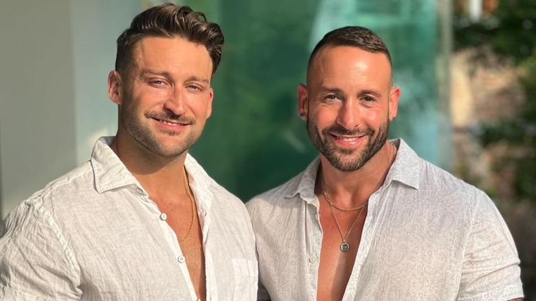 Carmine Sabatella and his husband smiling