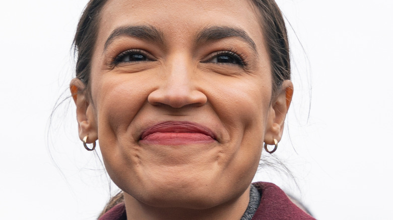 Close up of AOC smiling