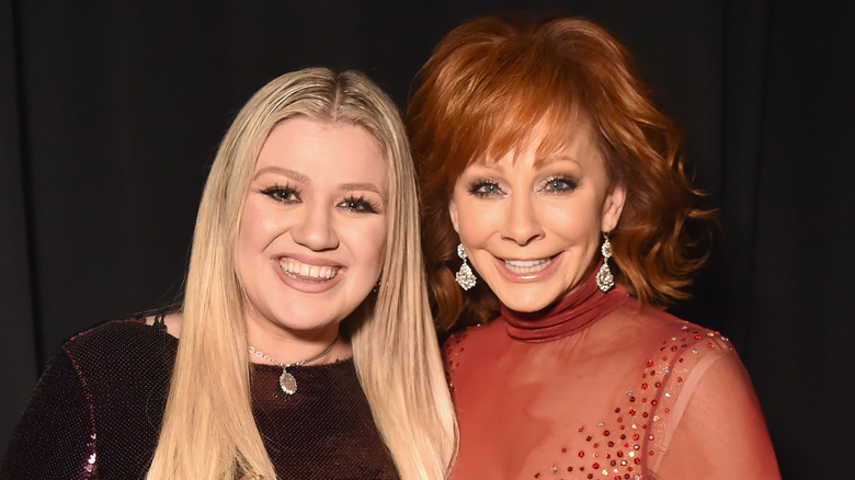 Kelly Clarkson with Reba McEntire.