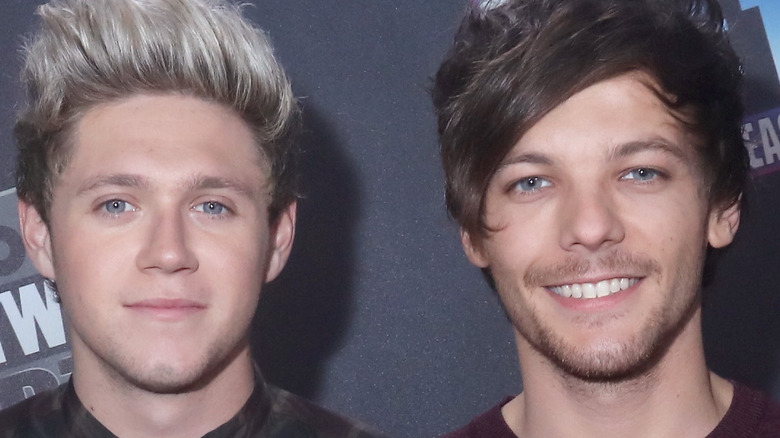 A side by side of Louis Tomlinson and Niall Horan