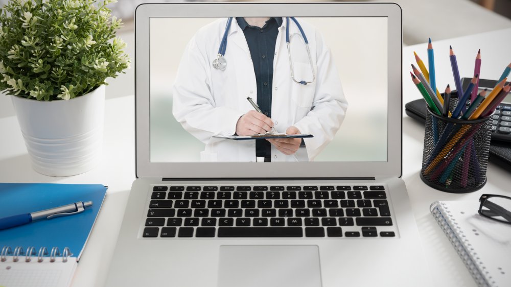 Doctor on computer