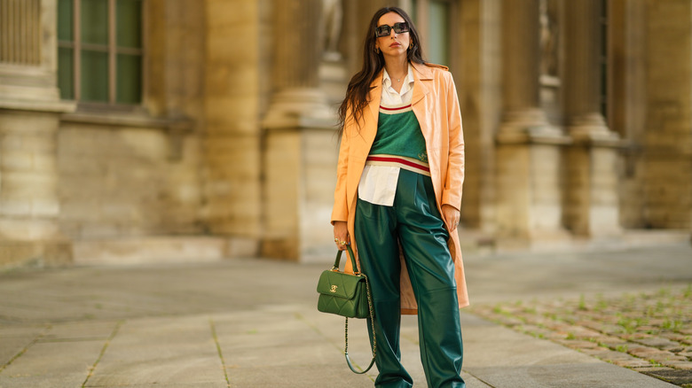 Woman in outfit using three-color rule