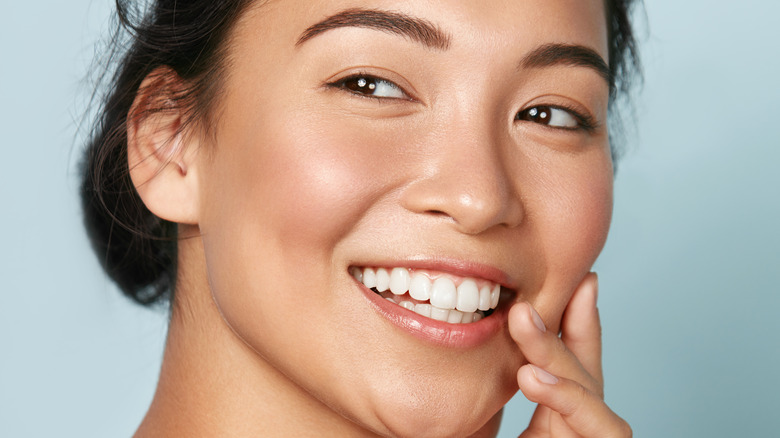 Woman showing white teeth