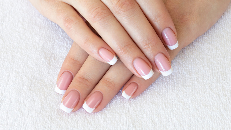 Person with French manicure