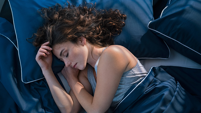 Woman sleeping in bed