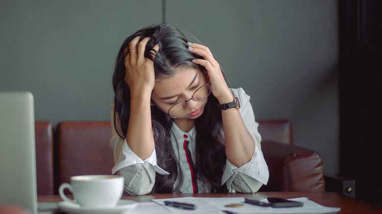 Woman worrying about job 