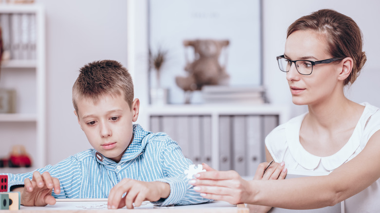 Child with teacher