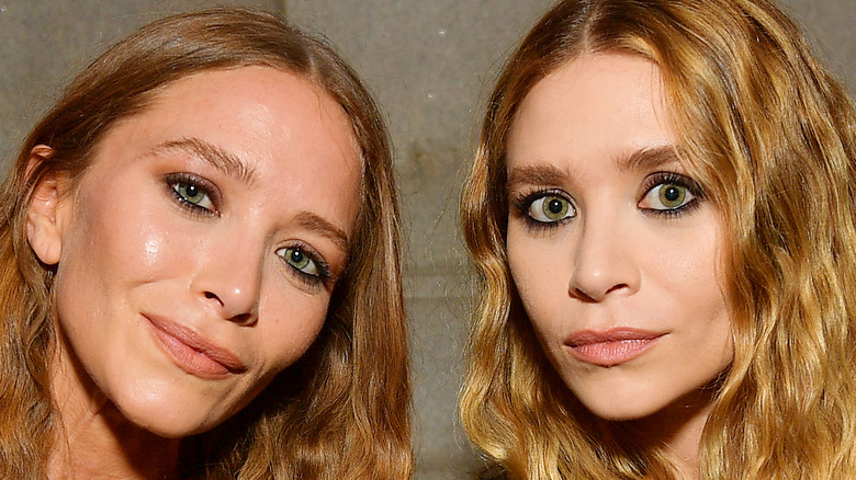 Mary-Kate and Ashley Olsen posing together in 2019